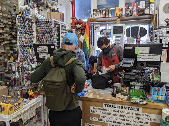 store cashiers wearing masks, but business as usual otherwise